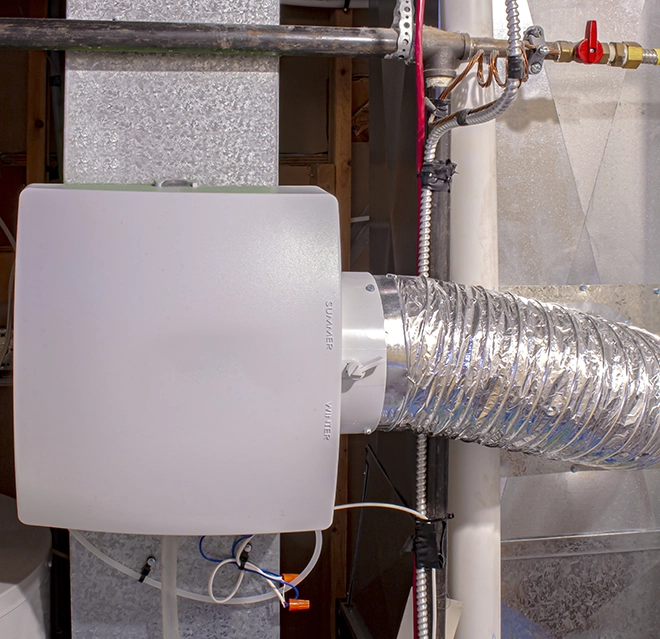 A side angled view of an installed humidifier.