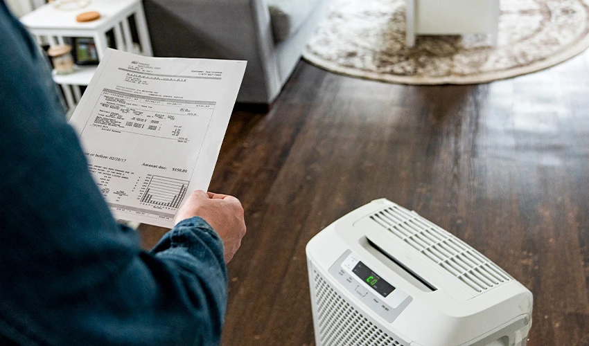 Person looking at energy bill.