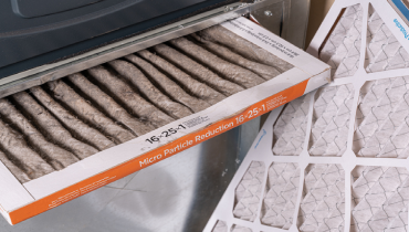 Replacing dirty furnace filter in home Top of Form Bottom of Form.