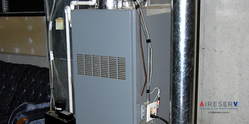 Old furnace next to sofa
